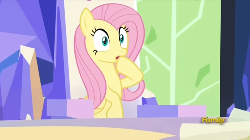 Size: 852x478 | Tagged: safe, derpibooru import, screencap, fluttershy, pony, sparkle's seven, discovery family logo, solo, surprised, throne room, twilight's castle