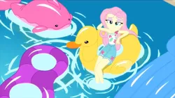 Size: 1280x720 | Tagged: safe, derpibooru import, fluttershy, equestria girls, equestria girls series, i'm on a yacht, spoiler:eqg series (season 2), clothes, floaty, inflatable, lidded eyes, looking at you, pool toy, shorts, smiling, solo, swimming pool