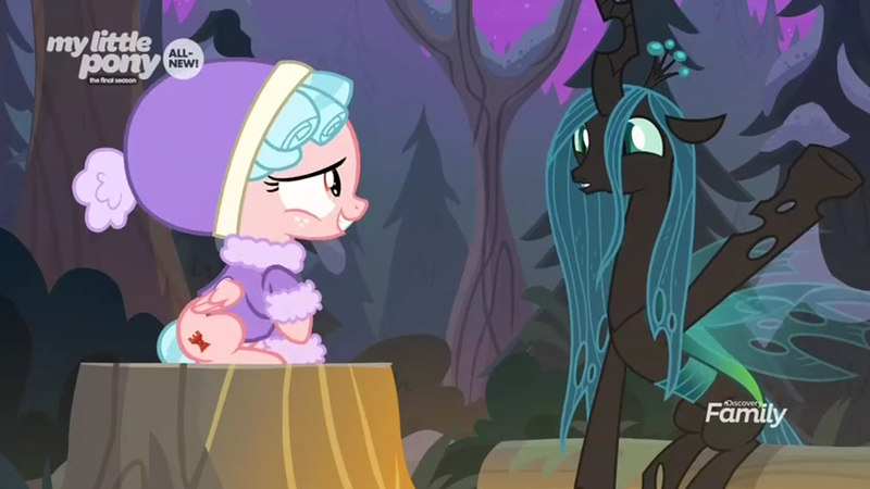 Size: 1366x768 | Tagged: safe, derpibooru import, screencap, cozy glow, queen chrysalis, changeling, changeling queen, pegasus, pony, frenemies (episode), clothes, cute, cutealis, discovery family logo, duo, female, filly, foal, forest, happy, hat, night, raised hoof, sitting, tree stump, winter outfit