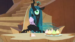 Size: 1800x1013 | Tagged: changeling, changeling queen, crossed hooves, cupcake, dead, derpibooru import, female, food, frenemies (episode), hoof hold, log, mean twilight sparkle, queen chrysalis, safe, screencap, solo, twilog