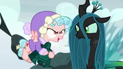 Size: 1920x1080 | Tagged: safe, derpibooru import, screencap, cozy glow, queen chrysalis, changeling, changeling queen, pegasus, pony, frenemies (episode), bell, clothes, cozy glow is best facemaker, duo, female, filly, foal, grogar's bell, winter outfit