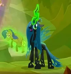 Size: 332x344 | Tagged: changeling, changeling queen, cropped, derpibooru import, female, frenemies (episode), glowing horn, happy, horn, magic, queen chrysalis, rarity plushie, safe, screencap, solo, telekinesis