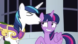 Size: 1280x720 | Tagged: safe, derpibooru import, screencap, shining armor, twilight sparkle, twilight sparkle (alicorn), alicorn, pony, unicorn, sparkle's seven, brother and sister, cropped, eyes closed, female, grin, male, mare, nervous, nervous grin, out of context, raised hoof, siblings, smiling, stallion