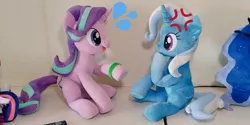 Size: 1024x512 | Tagged: safe, artist:nekokevin, derpibooru import, princess luna, starlight glimmer, trixie, twilight sparkle, alicorn, pony, unicorn, series:nekokevin's glimmy, student counsel, cross-popping veins, female, irl, looking at each other, mare, open mouth, photo, plushie, raised hoof, sitting, smiling, underhoof, wristband