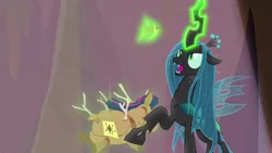 Size: 1920x1080 | Tagged: better way to be bad, changeling, changeling queen, crown, derpibooru import, doll, female, frenemies (episode), glowing horn, horn, jewelry, magic, queen chrysalis, regalia, safe, screencap, telekinesis, toy, twilight sparkle