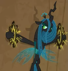 Size: 653x677 | Tagged: safe, derpibooru import, screencap, queen chrysalis, changeling, changeling queen, pony, frenemies (episode), annoyed, bondage, evil lair, eyeshadow, female, former queen chrysalis, grogar's lair, helpless, insect wings, lair, magic, magic aura, makeup, overpowered, solo, wings