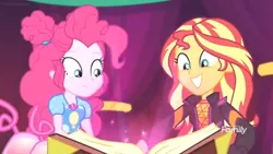 Size: 1366x768 | Tagged: safe, derpibooru import, screencap, pinkie pie, sunset shimmer, equestria girls, equestria girls series, sunset's backstage pass!, spoiler:eqg series (season 2), alternate hairstyle, discovery family logo, glow, magic book, smiling