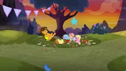 Size: 1920x1080 | Tagged: safe, derpibooru import, screencap, cheese sandwich, indian summer, kettle corn, lilac ice, pony, the last laugh, candy, food, laughing, on back, piñata, tree