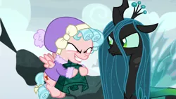 Size: 1920x1080 | Tagged: safe, derpibooru import, screencap, cozy glow, queen chrysalis, changeling, changeling queen, pegasus, pony, frenemies (episode), bell, bewitching bell, clothes, duo, female, filly, foal, grogar's bell, hat, winter outfit