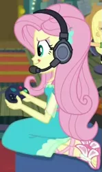 Size: 331x554 | Tagged: safe, derpibooru import, screencap, fluttershy, costume conundrum, equestria girls, equestria girls series, spoiler:eqg series (season 2), controller, cropped, cute, feet, gamer fluttershy, headphones, headset, headset mic, sandals, sitting, solo focus, tongue out