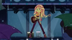 Size: 1366x768 | Tagged: safe, derpibooru import, screencap, duke suave, sunset shimmer, equestria girls, equestria girls series, let it rain, spoiler:eqg series (season 2), beautiful, guitar, musical instrument, rain, stage, umbrella