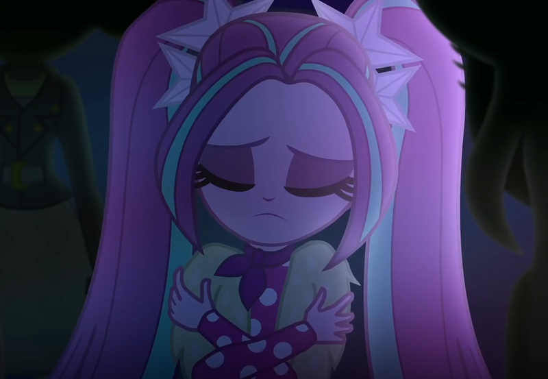 Size: 1562x1080 | Tagged: safe, derpibooru import, screencap, aria blaze, scribble dee, equestria girls, equestria girls series, find the magic, spoiler:eqg series (season 2), ascot, cropped, crossed arms, eyes closed, female, pigtails, polka dots, sad, twintails