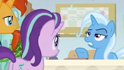 Size: 1600x900 | Tagged: safe, derpibooru import, screencap, starlight glimmer, sunburst, trixie, pony, a horse shoe-in, bulletin board, desk, office, starlight's office