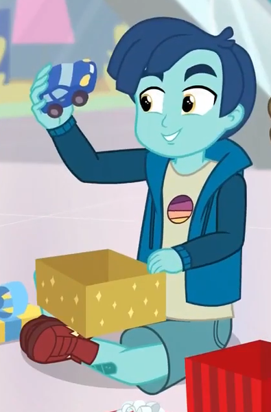 Size: 423x642 | Tagged: safe, derpibooru import, screencap, henry handle, manestrum, equestria girls, equestria girls series, holidays unwrapped, spoiler:eqg series (season 2), clothes, cropped, crossed legs, cute, legs, shoes, smiling, sneakers, toy, toy car