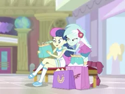 Size: 583x441 | Tagged: safe, derpibooru import, screencap, bon bon, lyra heartstrings, sweetie drops, equestria girls, equestria girls series, holidays unwrapped, spoiler:eqg series (season 2), cropped, mall, my little pony, present