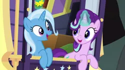 Size: 1920x1080 | Tagged: safe, derpibooru import, screencap, starlight glimmer, trixie, pony, unicorn, road to friendship, carriage, female, magic, mare, open mouth, singing, trixie's wagon, wagon, we're friendship bound