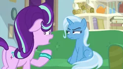 Size: 1280x720 | Tagged: safe, derpibooru import, screencap, starlight glimmer, trixie, pony, student counsel, book, butt, couch, floppy ears, plot, scroll, starlight's office