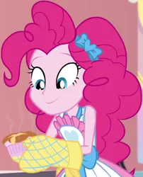 Size: 832x1030 | Tagged: safe, derpibooru import, screencap, pinkie pie, equestria girls, equestria girls series, holidays unwrapped, spoiler:eqg series (season 2), apron, bow, clothes, cropped, female, food, hair bow, kitchen, looking down, oven mitts, ramekin, saving pinkie's pie, shirt, skirt, sleeveless, sleeveless shirt, smiling, solo, souffle