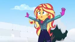 Size: 1600x900 | Tagged: safe, derpibooru import, screencap, sunset shimmer, equestria girls, equestria girls series, holidays unwrapped, spoiler:eqg series (season 2), apple, clothes, coat, flag, food, gloves, jacket, outstretched arms, raised hand, saving pinkie's pie, snow fort, solo, stop, wall, winter