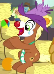 Size: 323x441 | Tagged: safe, derpibooru import, screencap, meadow song, earth pony, pony, appleoosa's most wanted, clown, clown nose, cropped, hat, hay bale, juggling, necktie, red nose, rodeo clown, solo, solo focus, sun hat