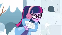 Size: 1920x1080 | Tagged: safe, derpibooru import, screencap, sci-twi, twilight sparkle, equestria girls, equestria girls series, holidays unwrapped, spoiler:eqg series (season 2), clothes, earmuffs, female, glasses, outdoors, snow, snow fort, snowball, snowball fight, solo, winter coat, winter outfit