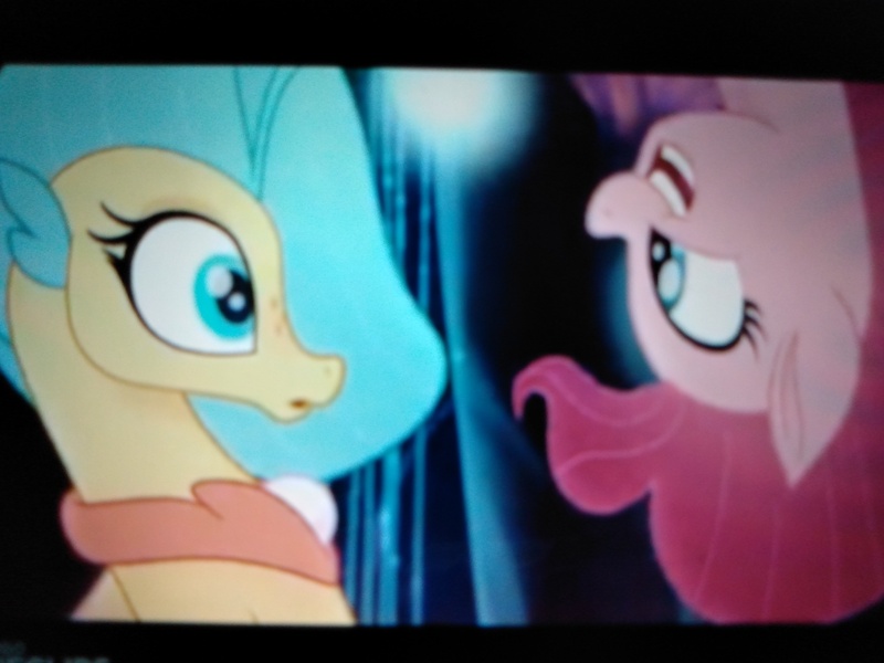 Size: 4160x3120 | Tagged: derpibooru import, duet, duo, female, glowing horn, happy, hippogriff, horn, looking at each other, my little pony: the movie, one small thing, photo, picture of a screen, pinkie pie, princess skystar, safe, screencap, seapony (g4), shocked expression, singing, smiling, song, upside down