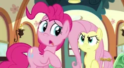 Size: 496x274 | Tagged: safe, derpibooru import, screencap, fluttershy, pinkie pie, earth pony, pegasus, pony, buckball season, angry, discovery family logo, fluttershy snaps, looking back, raised hoof, sad, this will not end well, train