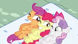 Size: 800x450 | Tagged: apple bloom, cutie mark crusaders, derpibooru import, grin, mattress, on back, one bad apple, one eye closed, safe, scootaloo, screencap, smiling, sweetie belle, wink