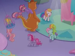 Size: 640x480 | Tagged: safe, derpibooru import, screencap, cheerilee (g3), pinkie pie (g3), rainbow dash (g3), starsong, toola roola, twinkle wish, whimsey weatherbe, dragon, pony, twinkle wish adventure, cage, circle, female, g3, g3.5, mare, surrounded, that's what makes a friend