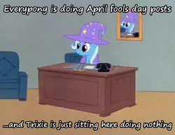 Size: 463x358 | Tagged: safe, artist:evil-dec0y, derpibooru import, trixie, pony, unicorn, april fools, cape, caption, clothes, desk, female, hat, image macro, mare, meme, parody, phone, solo, text, trixie's cape, trixie's hat