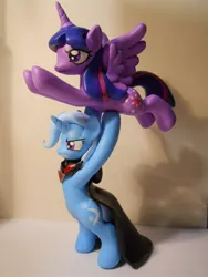 Size: 1536x2048 | Tagged: safe, artist:earthenpony, derpibooru import, trixie, twilight sparkle, twilight sparkle (alicorn), alicorn, pony, alicorn amulet, fastball special, female, figurine, lesbian, mare, shipping, twixie