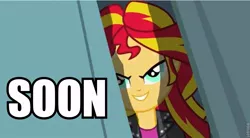 Size: 853x470 | Tagged: safe, derpibooru import, sunset shimmer, equestria girls, equestria girls (movie), caption, evil, grin, image macro, shimmer peekaboo, smiling, solo, soon, text