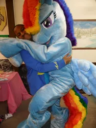 Size: 720x960 | Tagged: artist:judhudson, brony, derpibooru import, fursuit, hug, human, irl, irl human, photo, rainbow dash, safe