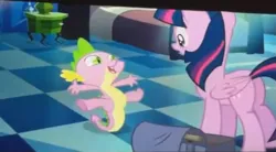 Size: 845x467 | Tagged: safe, derpibooru import, screencap, spike, twilight sparkle, twilight sparkle (alicorn), alicorn, equestria girls, equestria girls (movie), butt, featureless crotch, out of context, plot, tail stand