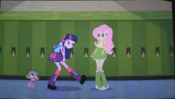 Size: 1445x819 | Tagged: safe, derpibooru import, screencap, fluttershy, spike, twilight sparkle, dog, equestria girls, equestria girls (movie), backpack, boots, clothes, high heel boots, lockers, out of context, shoes, skirt, socks, spike the dog