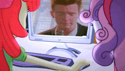 Size: 1256x720 | Tagged: safe, derpibooru import, edit, edited screencap, screencap, apple bloom, sweetie belle, equestria girls, equestria girls (movie), animated, computer, meme, never gonna give you up, obligatory pony, rick astley, rickroll, the crusaders browse the internet
