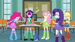 Size: 1128x630 | Tagged: safe, derpibooru import, screencap, applejack, fluttershy, pinkie pie, rarity, twilight sparkle, equestria girls, equestria girls (movie), charlie brown, classroom, disguise, incomplete twilight strong, peanuts, table, tara strong, voice actor joke