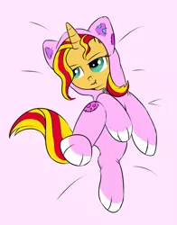 Size: 600x767 | Tagged: safe, artist:xioade, derpibooru import, sunset shimmer, cat, pony, unicorn, :t, animal costume, bed, cat costume, cat's pajamas, clothes, costume, footed sleeper, kigurumi, nyanset shimmer, pajamas, pouting, solo