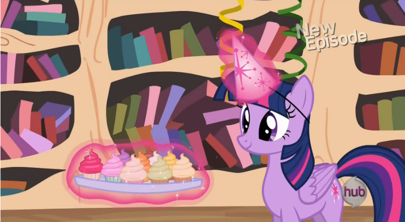 Size: 853x467 | Tagged: safe, derpibooru import, screencap, twilight sparkle, twilight sparkle (alicorn), alicorn, pony, daring don't, adorkable, cupcake, cute, dork, female, food, hat, levitation, magic, mare, national random holiday party day, party hat, smiling, solo, telekinesis