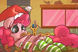 Size: 1200x807 | Tagged: safe, artist:atryl, derpibooru import, pinkie pie, earth pony, pony, bondage, braveheart, candy, candy cane, christmas, clothes, female, food, gingerbread man, gulliver's travels, hat, holiday, licorice, mare, parody, rope, santa hat, size difference, socks, tied up, william wallace