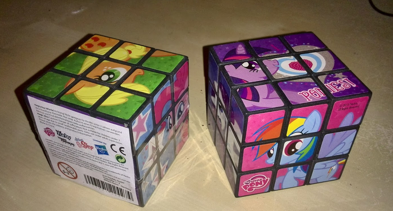 Size: 818x440 | Tagged: applejack, derpibooru import, furby, littlest pet shop, logo, merchandise, official, pinkie pie, rainbow dash, rarity, rubik's cube, safe, transformers, twilight sparkle