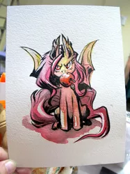 Size: 710x949 | Tagged: safe, artist:mamath, derpibooru import, fluttershy, bat pony, bats!, apple, bat ponified, convention, flutterbat, food, looking at you, mouth hold, photo, ponycon au, race swap, solo, traditional art, watercolor painting