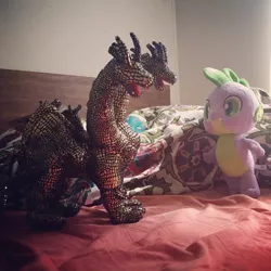 Size: 500x500 | Tagged: build-a-bear, derpibooru import, fight, godzilla (series), irl, kaiju, keizer ghidorah, photo, plushie, safe, spike, spike plushie, toy