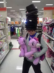 Size: 500x667 | Tagged: brony, deal with it, derpibooru import, fedora shaming, hat, human, irl, irl human, photo, safe, target (store), this isn't even my final form, towering pillar of hats, trilby, twilight sparkle