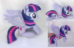 Size: 1105x722 | Tagged: safe, artist:epicrainbowcrafts, derpibooru import, twilight sparkle, twilight sparkle (alicorn), alicorn, pony, beanie (plushie), female, irl, mare, photo, plushie, prone, sitting, solo, spread wings, wings