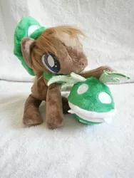 Size: 774x1032 | Tagged: artist:catzilerella, augmented tail, beanie (plushie), cap, derpibooru import, hat, irl, luigi's hat, monster pony, oc, oc:pixel, original species, photo, piranha plant, piranha plant pony, plant, plant pony, plushie, safe, solo, super mario bros., unofficial characters only