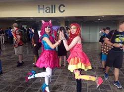 Size: 526x394 | Tagged: safe, artist:lochlan o'neil, artist:sarahndipity cosplay, derpibooru import, pinkie pie, sunset shimmer, human, bronycon, equestria girls, rainbow rocks, clothes, cosplay, costume, high heels, irl, irl human, pantyhose, photo, shoes, skirt