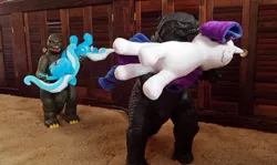 Size: 1024x611 | Tagged: artist:onlyfactory, bootleg, crossover, derpibooru import, godzilla, godzilla 2014, godzilla (series), irl, jakks pacific, kaiju, photo, plushie, rarity, safe, shogun warriors, trixie