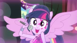 Size: 1440x808 | Tagged: safe, derpibooru import, screencap, twilight sparkle, twilight sparkle (alicorn), alicorn, equestria girls, perfect day for fun, rainbow rocks, bracelet, cute, grinning at you, image, jewelry, looking at you, open mouth, png, ponied up, rainbooms outfit, shoulder up, sleeveless, spread wings, twiabetes, wings
