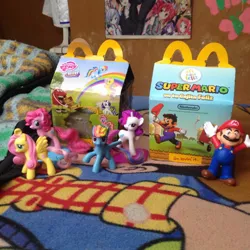 Size: 960x960 | Tagged: derpibooru import, fluttershy, happy (mcdonalds), irl, kasane teto, mario, mcdonald's, mcdonald's happy meal toys, mexico, nintendo, photo, pinkie pie, rainbow dash, rainbow power, rarity, safe, source needed, spanish, super mario bros., toy, useless source url